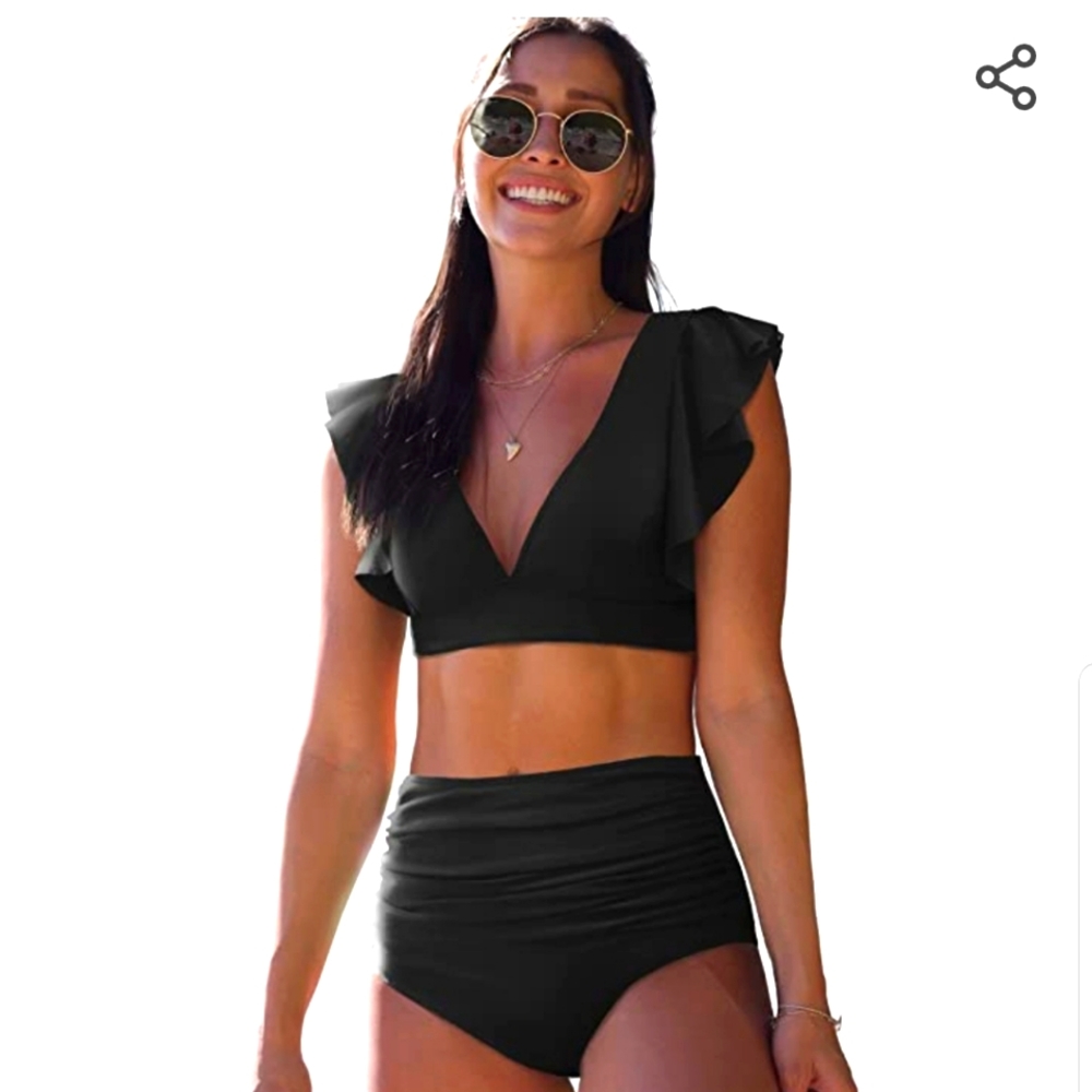 Like new 3 piece set ruffle sleeve top & 2 bottoms.